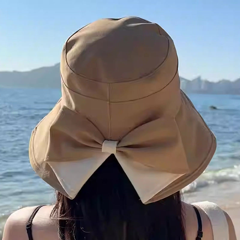 👒 Summer Hot Sale 50% OFF ! 💐 Women's Bowknot Wide Brim Sun Protective Hat – Oversized wide brim blocks UV rays, delicate bow decor, lightweight breathable fabric, ideal for beach, travel & outdoor walking✨