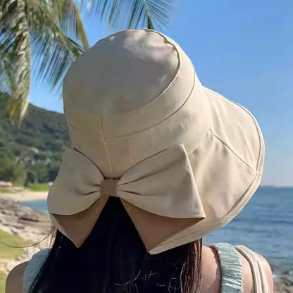 👒 Summer Hot Sale 50% OFF ! 💐 Women's Bowknot Wide Brim Sun Protective Hat – Oversized wide brim blocks UV rays, delicate bow decor, lightweight breathable fabric, ideal for beach, travel & outdoor walking✨